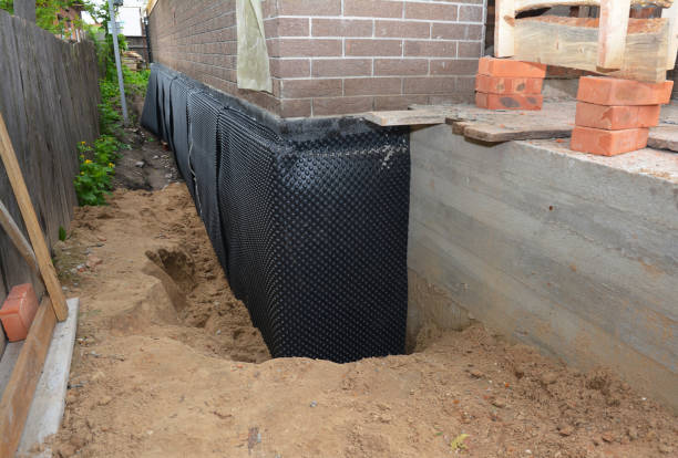 Happy homeowners after waterproofing job in Harriman